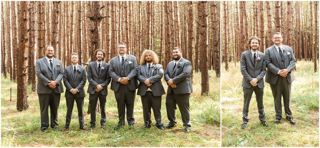 bridal party lined up in tall red pines
